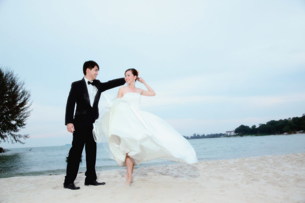 How to Plan Your Dream Destination Wedding - 5 Essential Tips You Must Know- Bride and Groom on the beach 