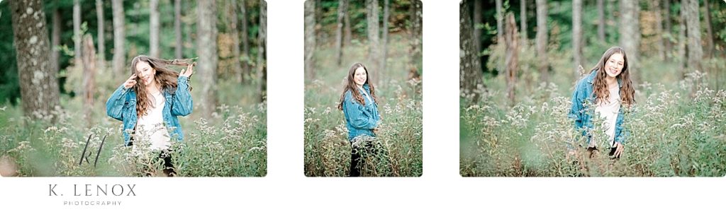 Senior Photo in Chesterfield NH of a girl wearing a Vintage Levi's Jean Jacket in a field of grasses. 
