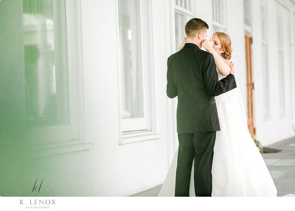 Bride and Groom share a moment during their first look at the Omni Mount Washington Resort. 