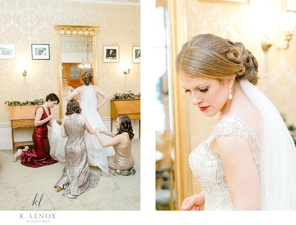 Bride gets her gown bustled after her Christmas wedding at the Omni Mount Washington Resort. 