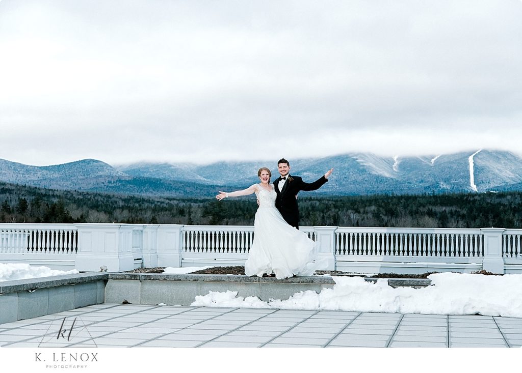 Bride and Groom on the Jewel Terrace at the Omni Mount Washington Resort on their Christmas Season Wedding day. 
