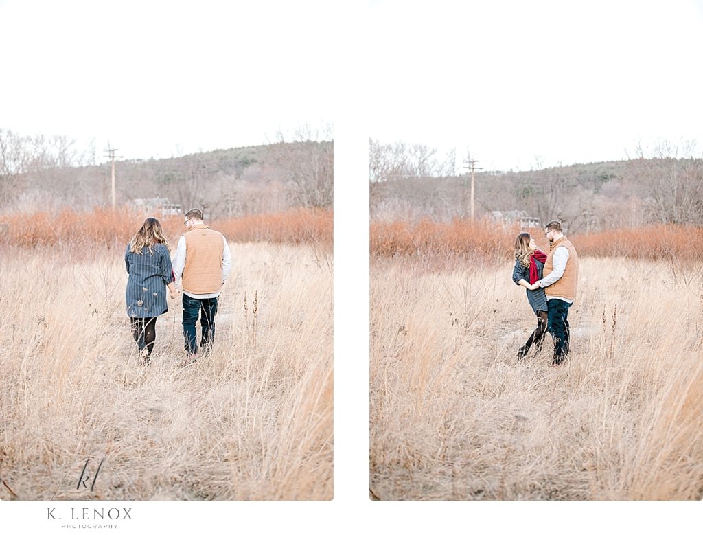 Light and Airy Winter Engagement Session of a man and woman in a field of soft golden wheat grass. 