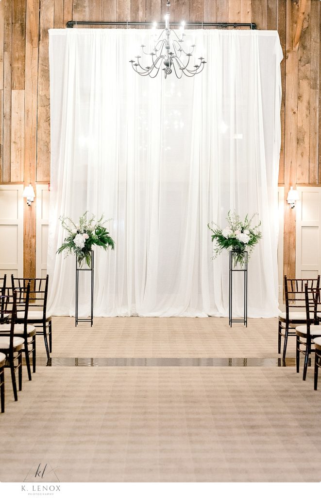 Indoor Wedding Ceremony site for a Winter wedding at the Barn at Gibbet Hill. 