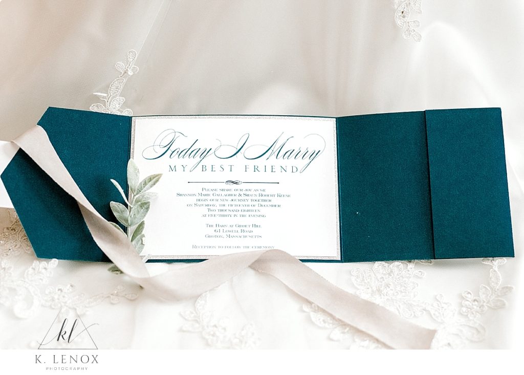 Wedding invitation suite that is blue and white for a winter wedding. 