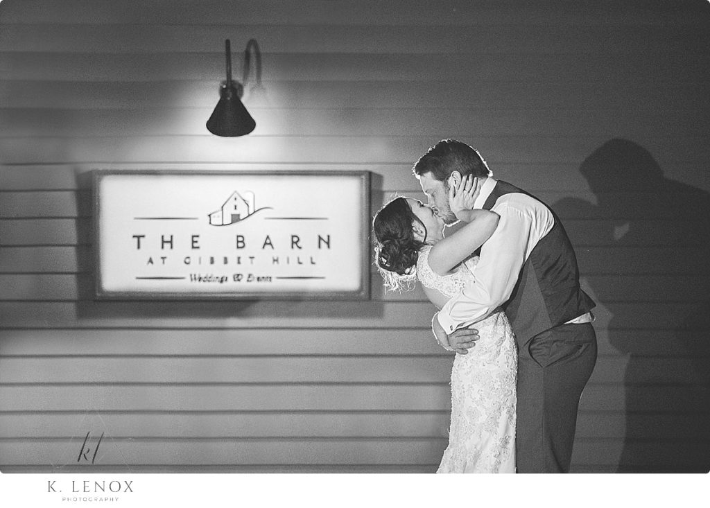 Black and White photo using off camera flash of a bride and groom at the Barn at Gibbet Hill. 
