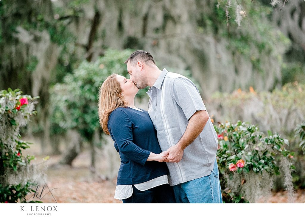 Husband and Wife kiss for a light and airy portrait in Beaufort SC. 