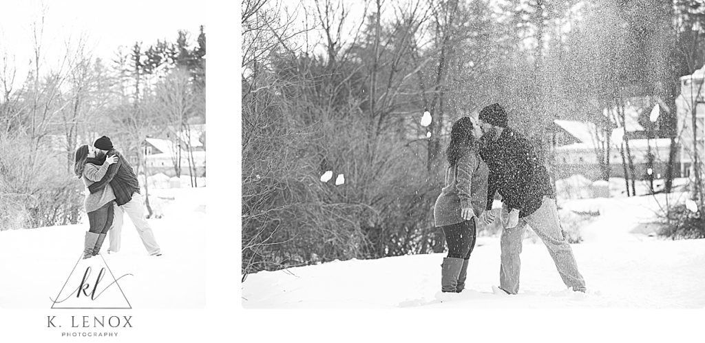 Candid and playful black and white photo of an engaged couple throwing snow at each other during their winter engagement session. 