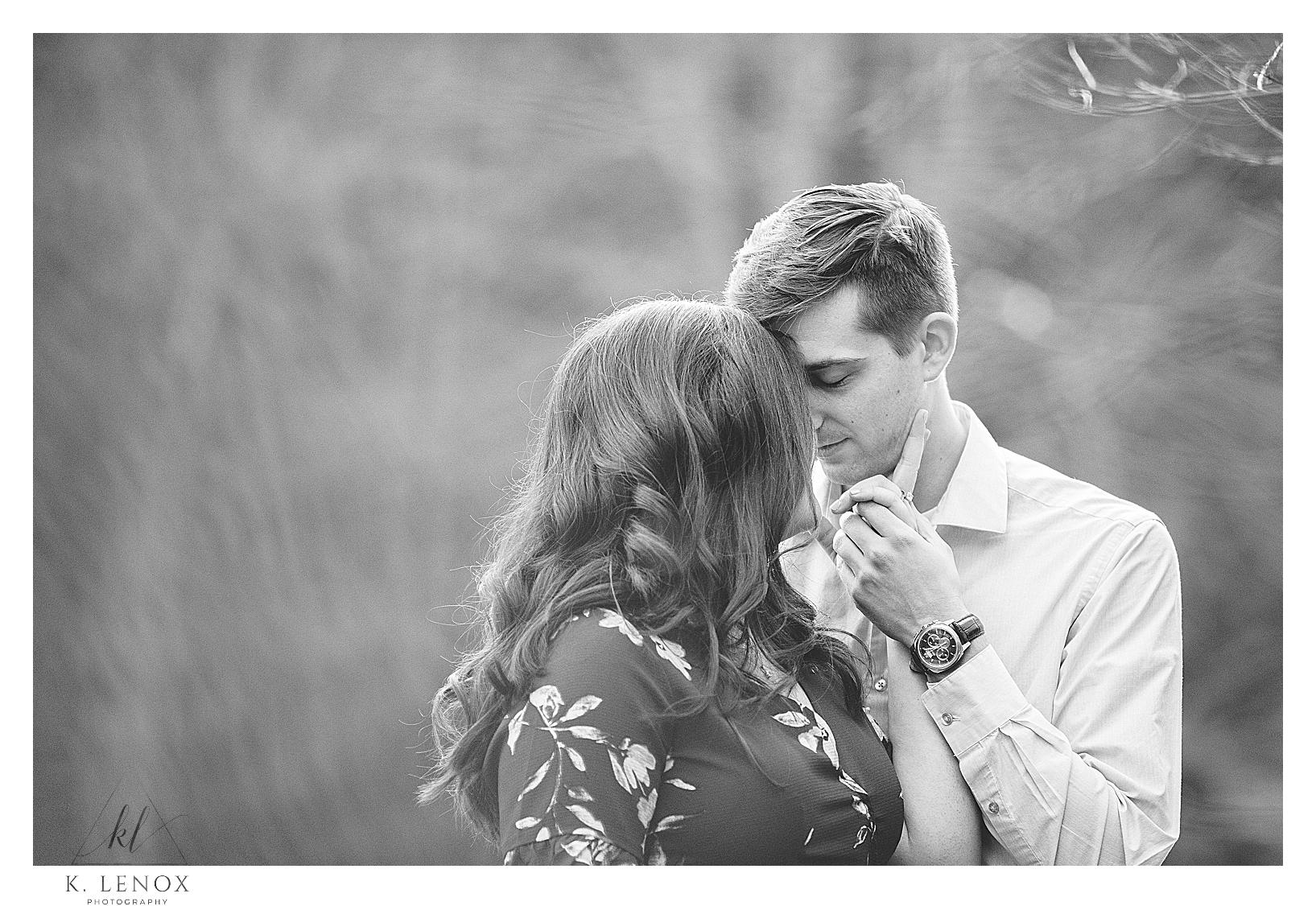 Black and white image of a man and woman during their Engagement Session in Peterborough NH