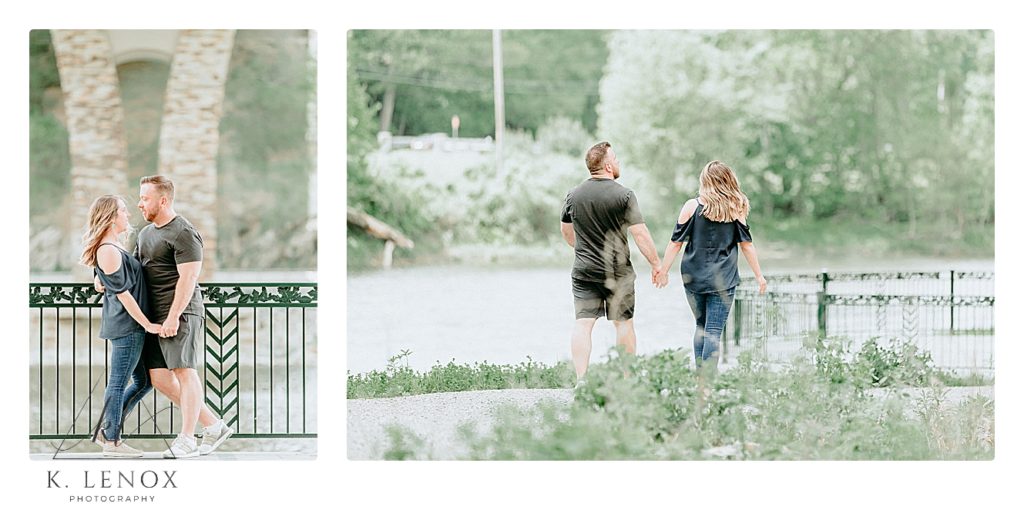 Relaxed Engagement session in Brattleboro VT with a Man and Woman- holding hands and walking under a bridge. 