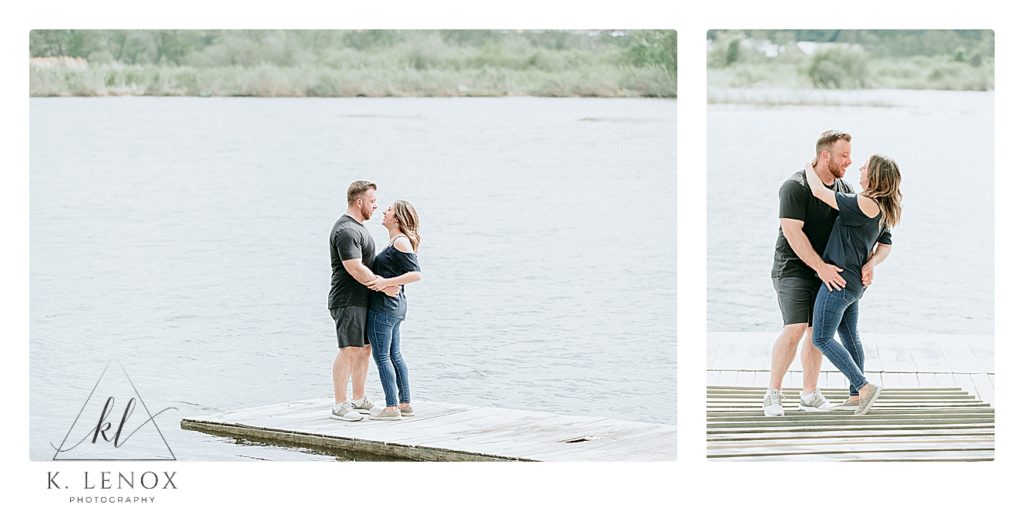 Engaged couple walking on a dock next to the CT River in Brattleboro VT during their engagement session. 