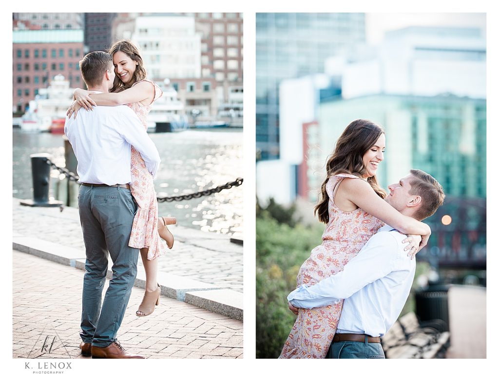 Seaport Boston Engagement Session where a man is lifting his fiance up.   Photo by K. Lenox Photography