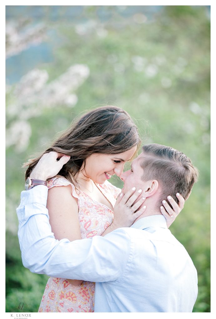 Candid and emotional light and airy engagement photo by K. Lenox Photography