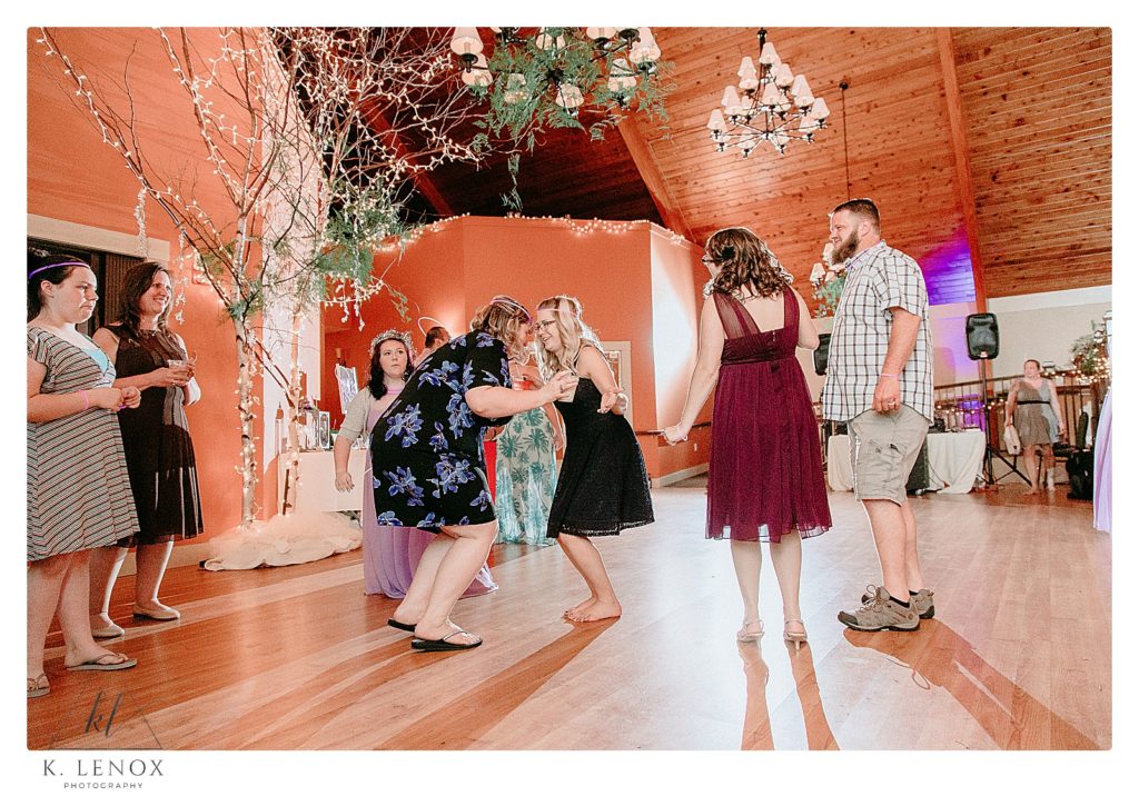 People Dancing: Candid Photo Wedding Reception at the Shattuck Golf Club in Jaffrey nh. 