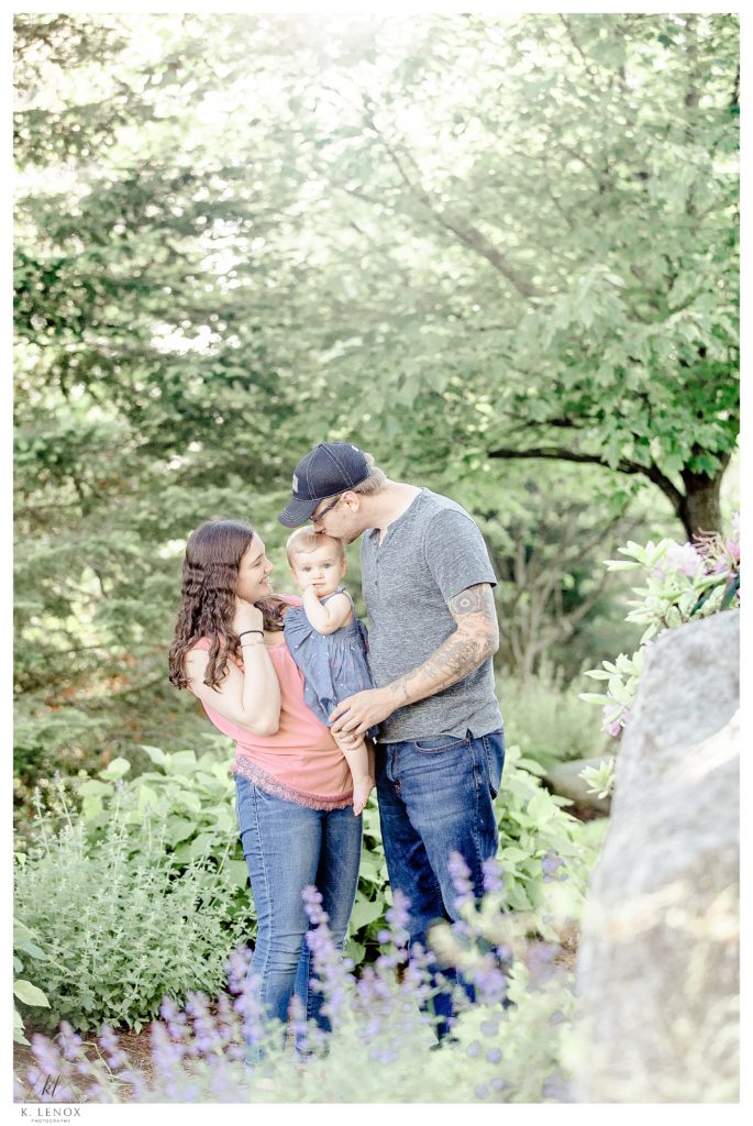 Light and Airy engagement photo taken at Cathedral of the Pines in Rindge NH.  Family of Three, all wearing Jeans. 