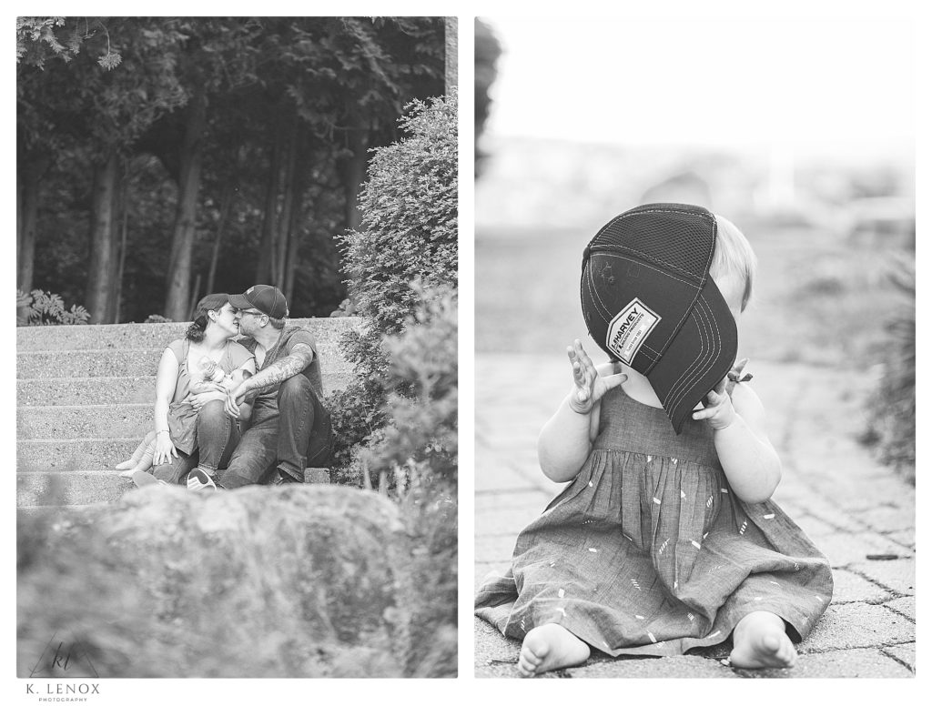 Black and White photo showing a little girl (10 month old) wearing her daddy's hat. 
