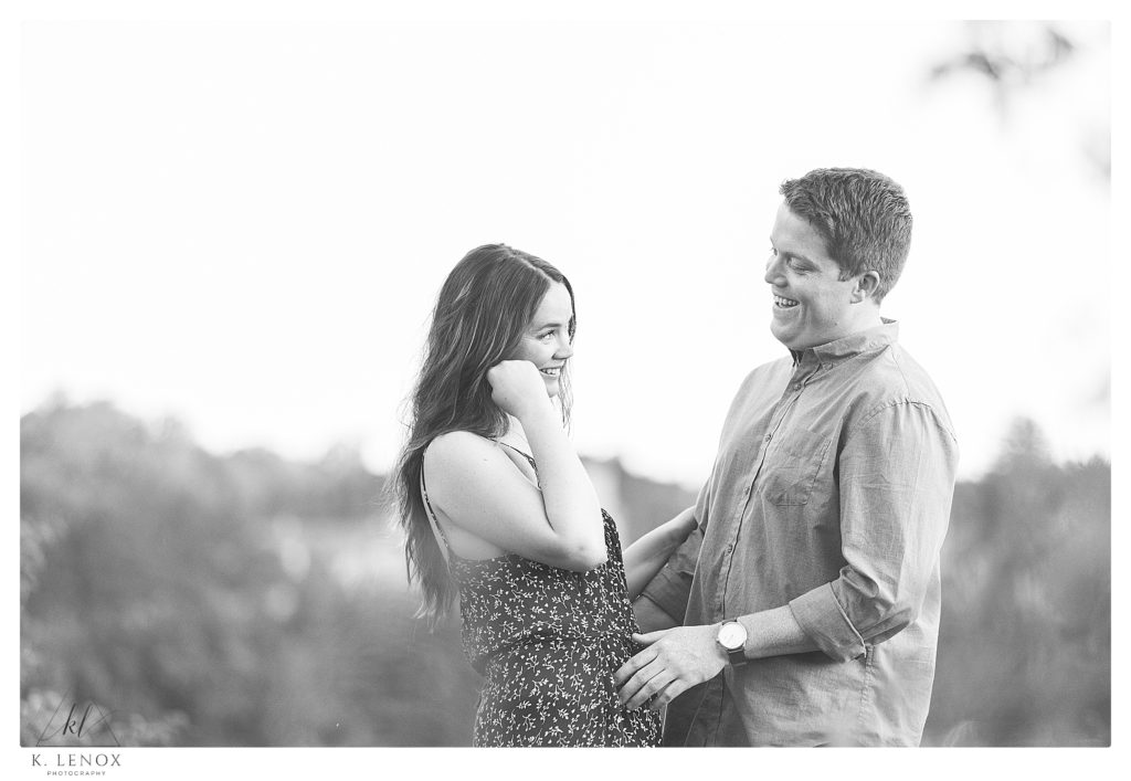 Black and White picture of a tender moment between a couple during their Outdoor Engagement Session in Brattleboro VT