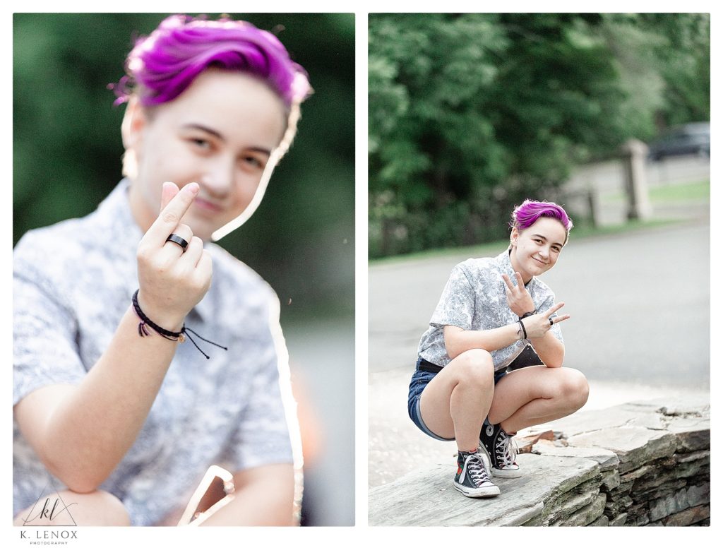 Portrait of an asexual girl showing her black pride ring that symbolizes her asexualuality . 