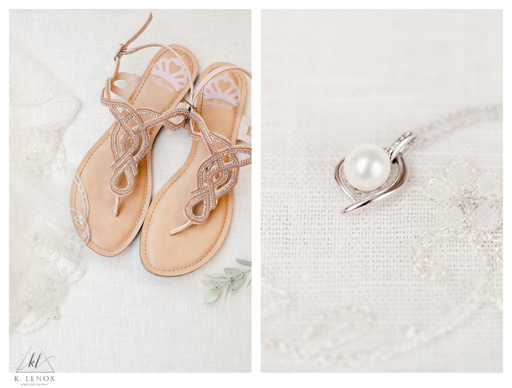 Bridal details showing strappy sandals and a white gold and pearl necklace. 