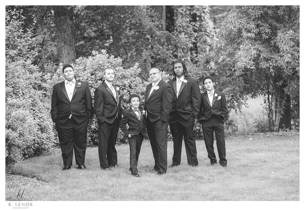 Black and White photo showing a Groom with his Groomsmen at Alpine Grove in Hollis NH. 