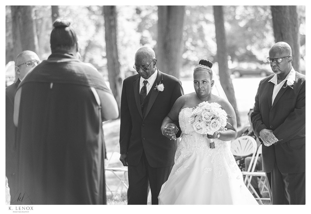 Classic wedding at Alpine Grove in Hollis NH.  Black and White photo of a bride and her father at the Altar