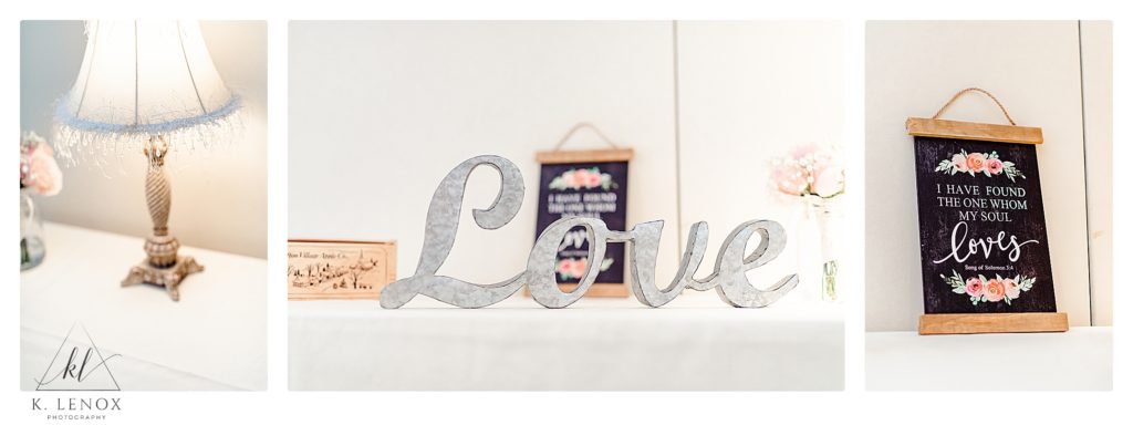 Classic Wedding at Alpine Grove in Hollis NH.   Detail shots at the entrance table showing a lamp and a love sign. 