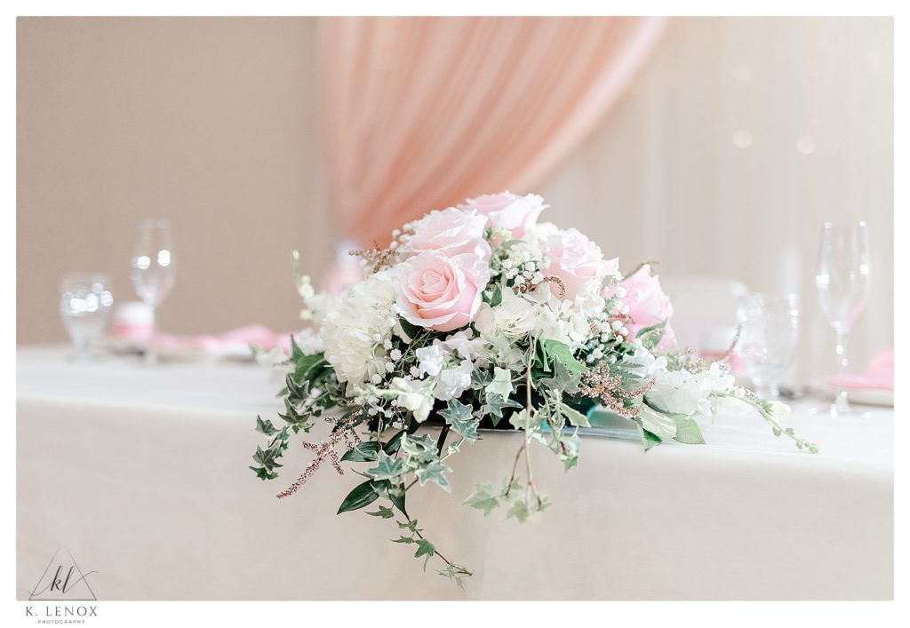 Classic Wedding at Alpine Grove in Hollis NH. - White and pink roses and baby's' breath on the head table. 