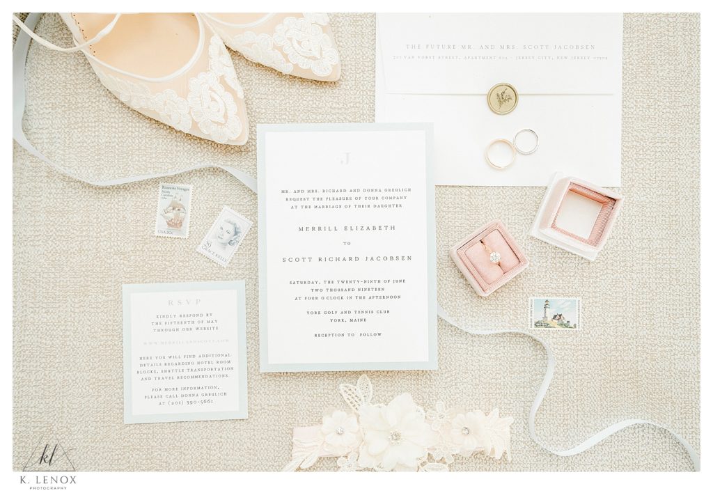 Flat lay showing Shrine Wedding Invitations for a wedding at The York Golf and Tennis Club in Maine. 