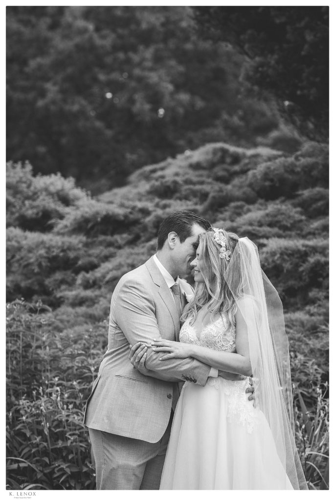Black and White photo of a bride and groom at their wedding at the York Golf and Tennis Club in Maine.