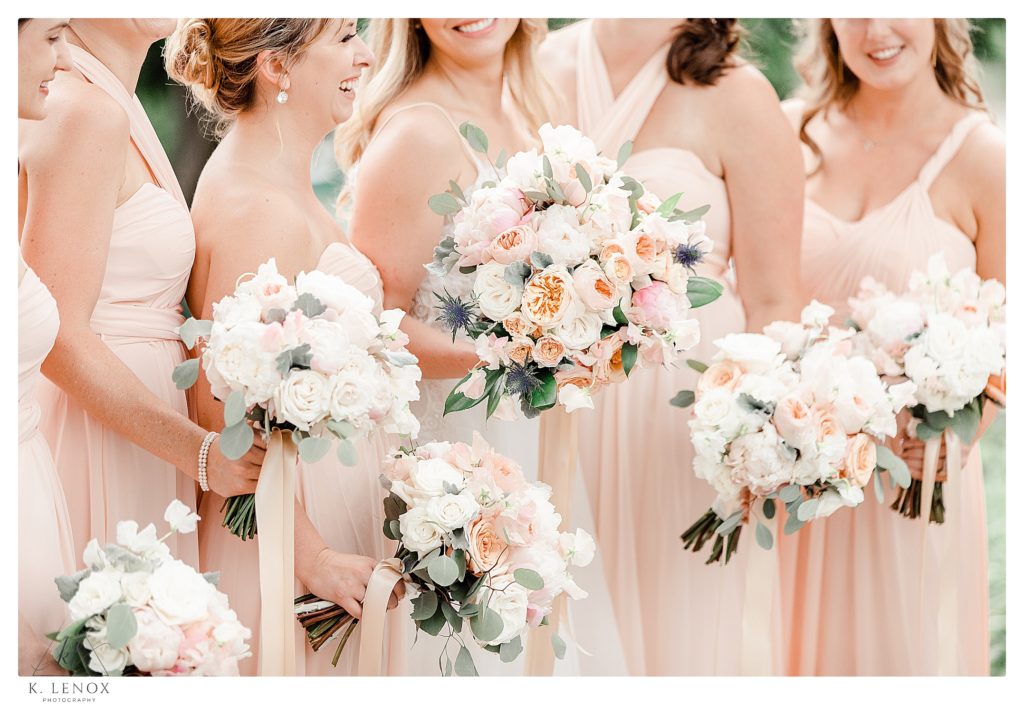 Bridal bouquets with light pink and white flowers. 