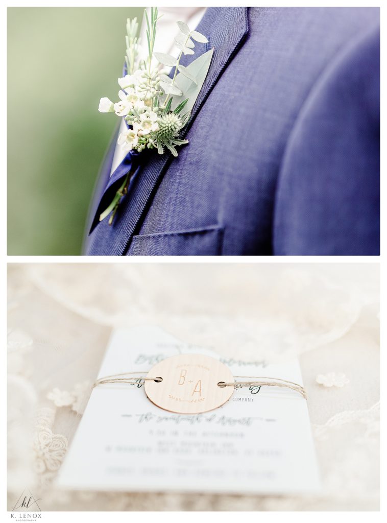 Detail photo showing a boutonniere of white flowers and greenery as well as a white invitation. 