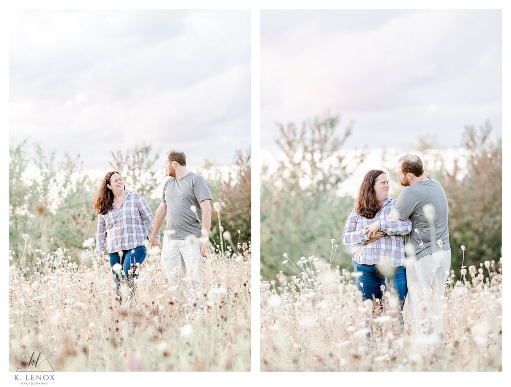 Light and Airy Engagement Session at Alyson's Orchard showing a man and woman standing in a field of wheat-like grasses. 