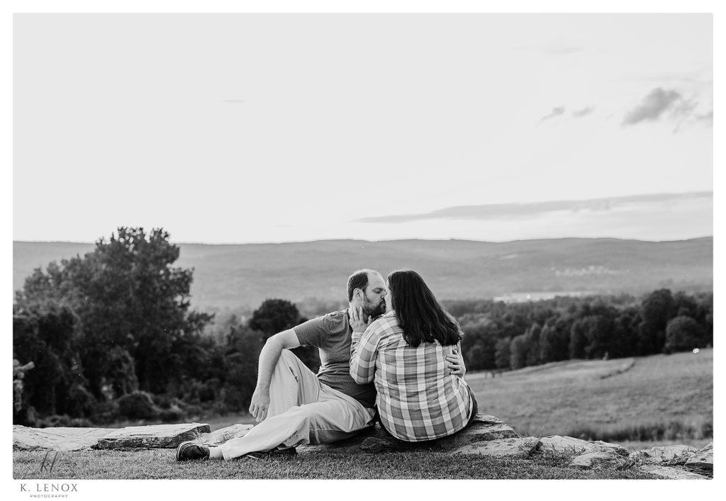 Light and Airy Engagement Session at Alyson's Orchard- showing a black and white photo of a couple over looking the Valley. 