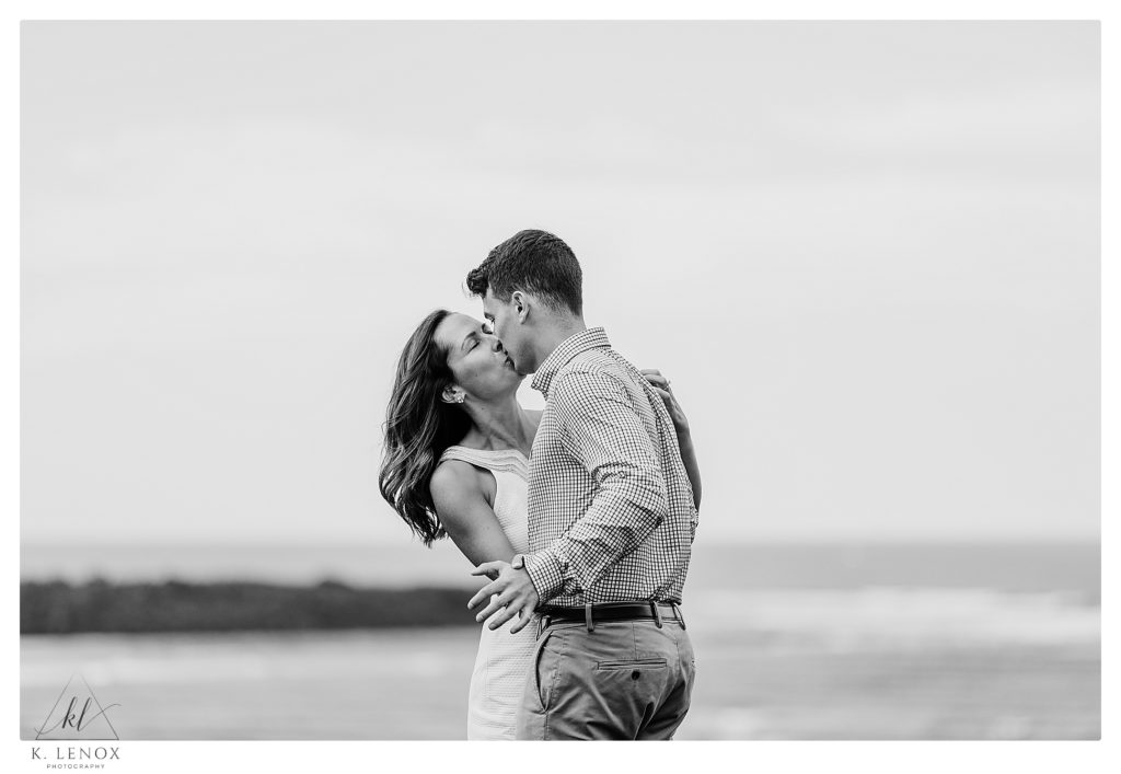 Black and White photo taken overlooking the ocean at the Crane Estates during an engagement session.  