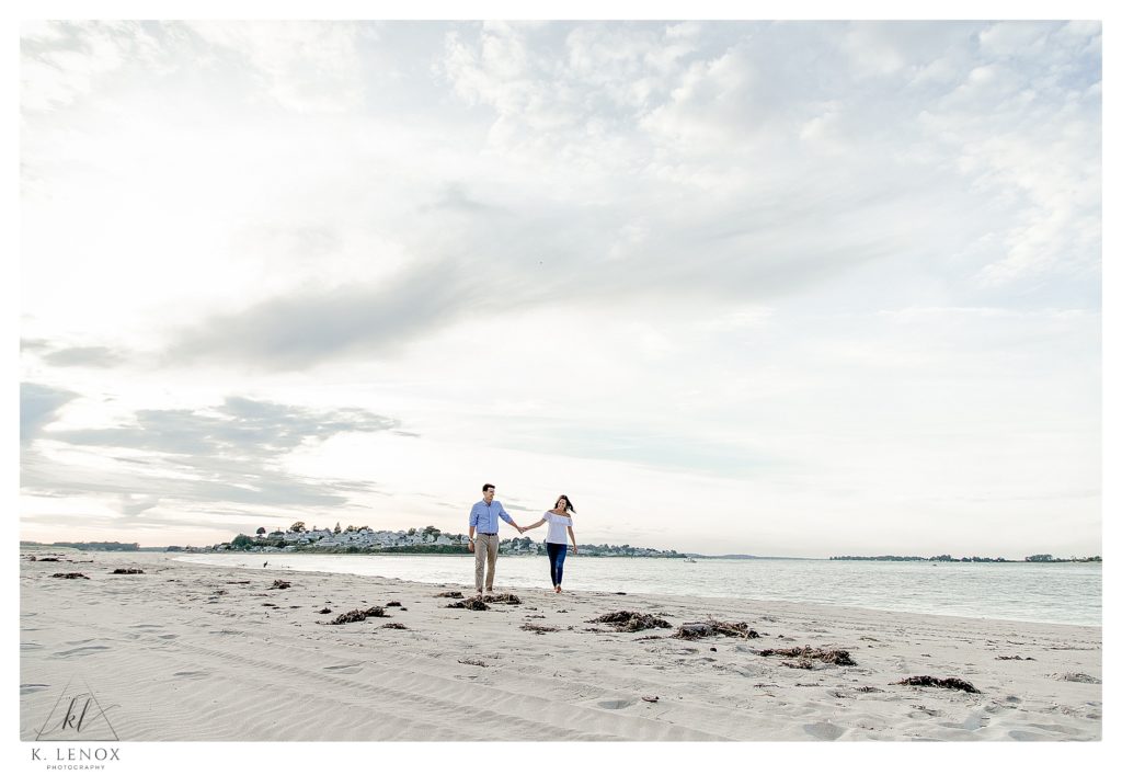 Light and Airy photo taken on the beach during an Engagement Session at the Crane Estates