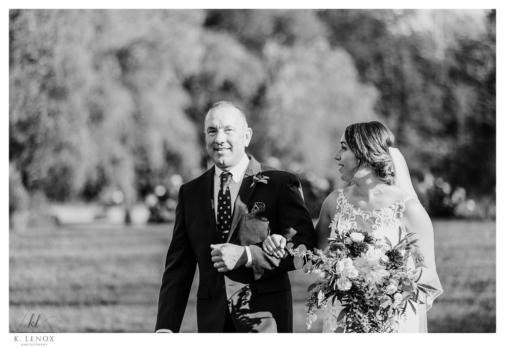 Wedding at Topnotch Resort - Bride Walking down the aisle with her father. 