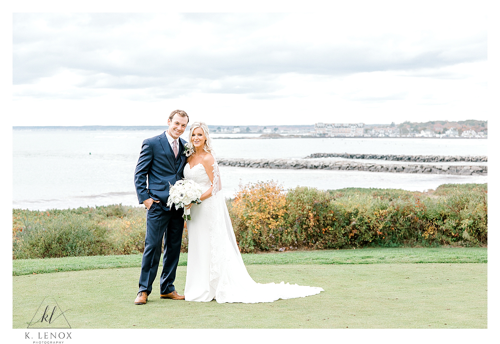 Bride and groom on their wedding day- overlooking the ocean from the Colony Hotel in Kennebunkport Maine
