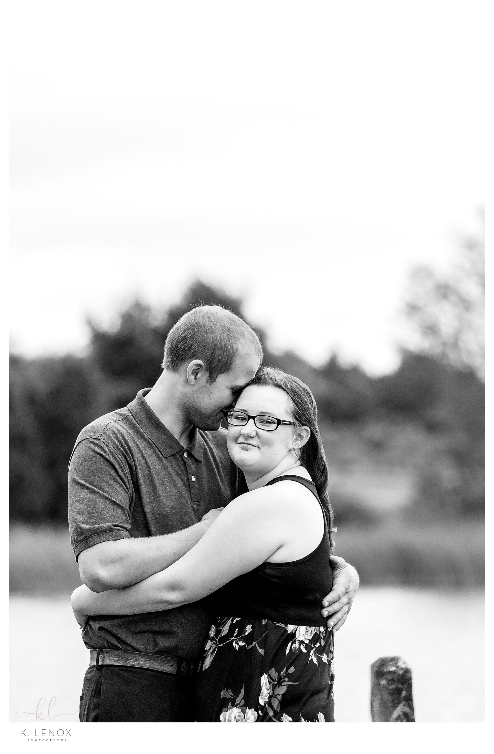 Black and White portrait of an engaged couple at Alyson's Orchard