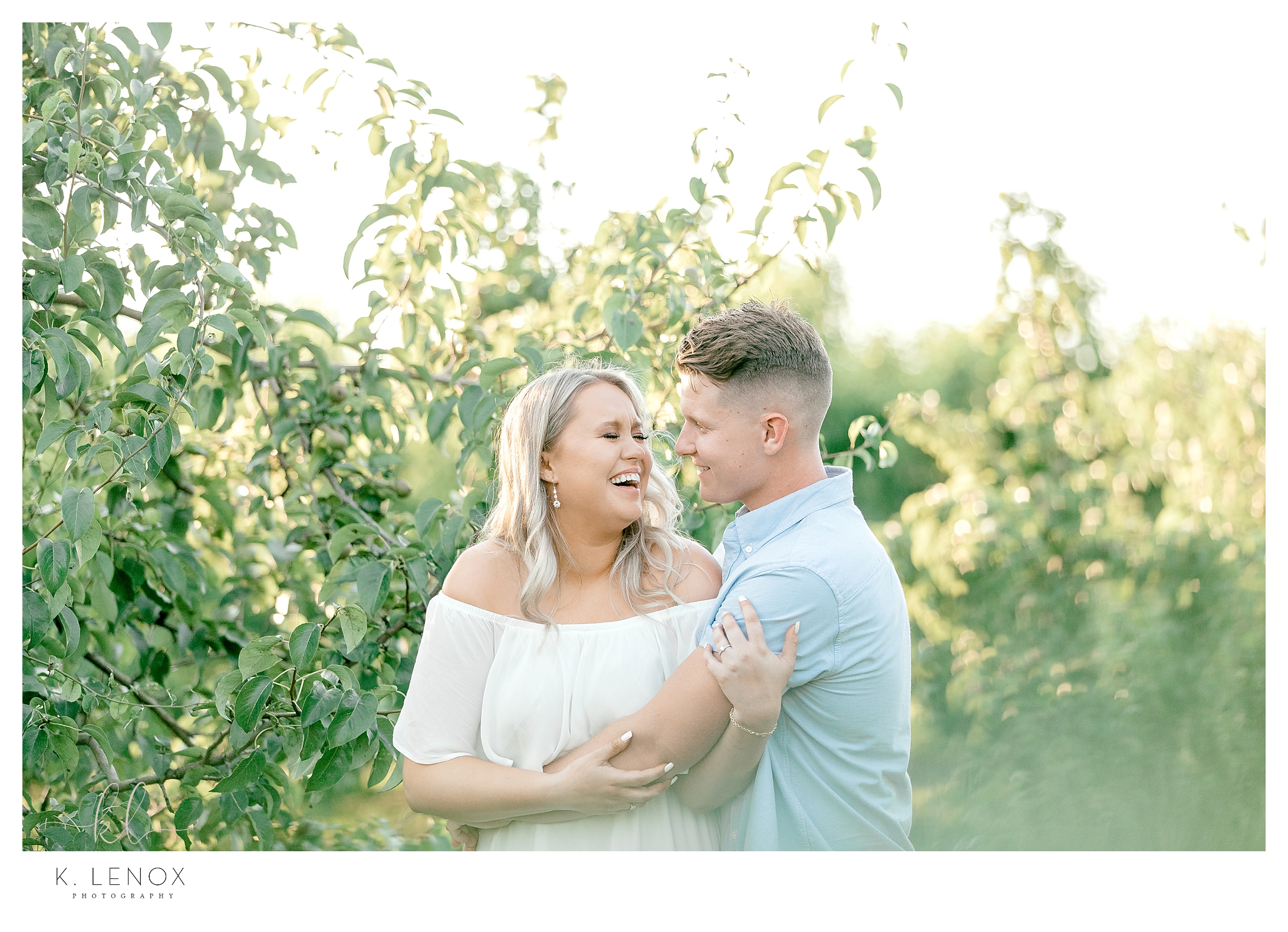 Light and Airy Wedding Photographer shoots a light and airy engagement photos at Alyson's Orchard