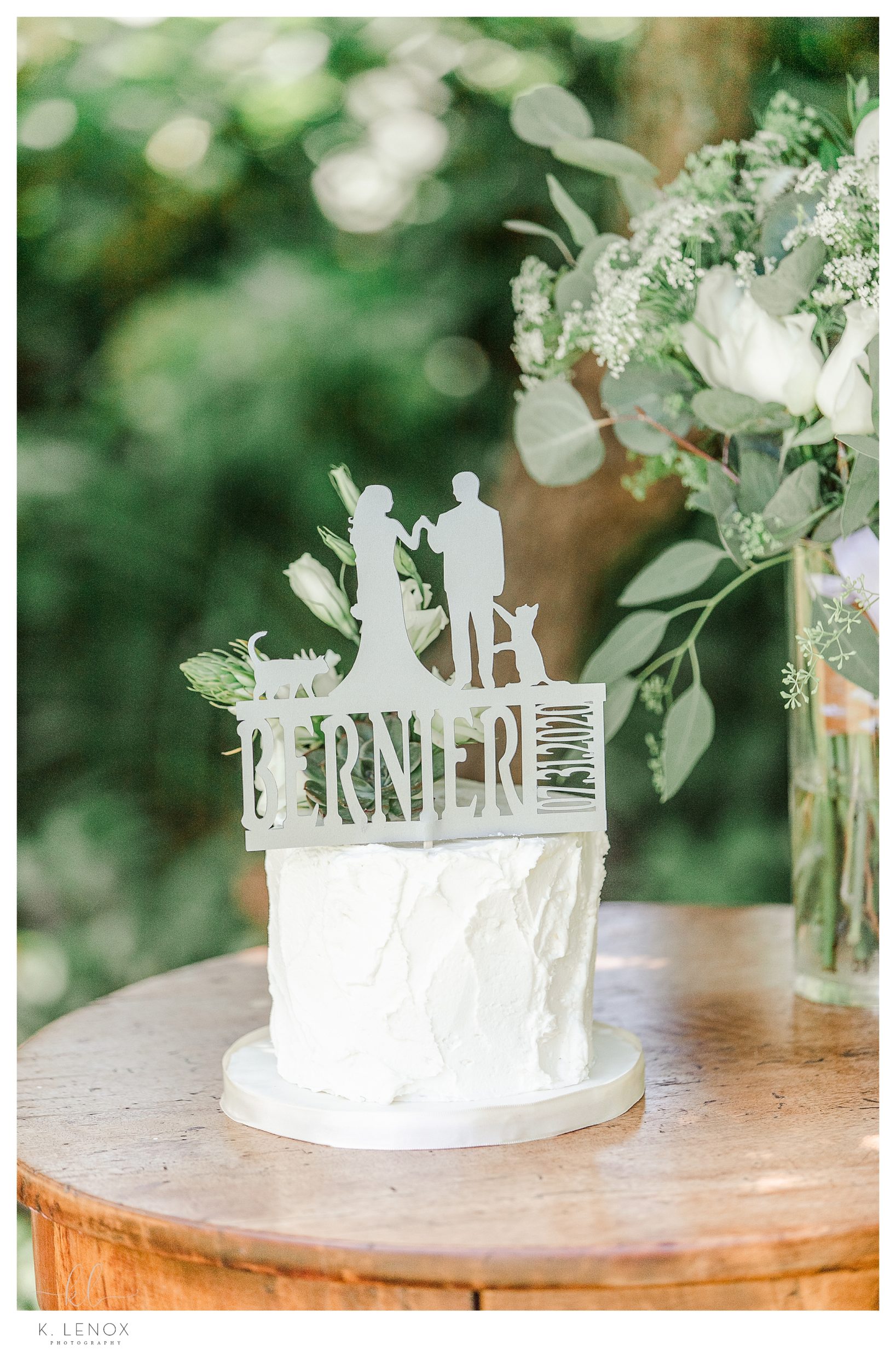 White, single tier wedding cake.  