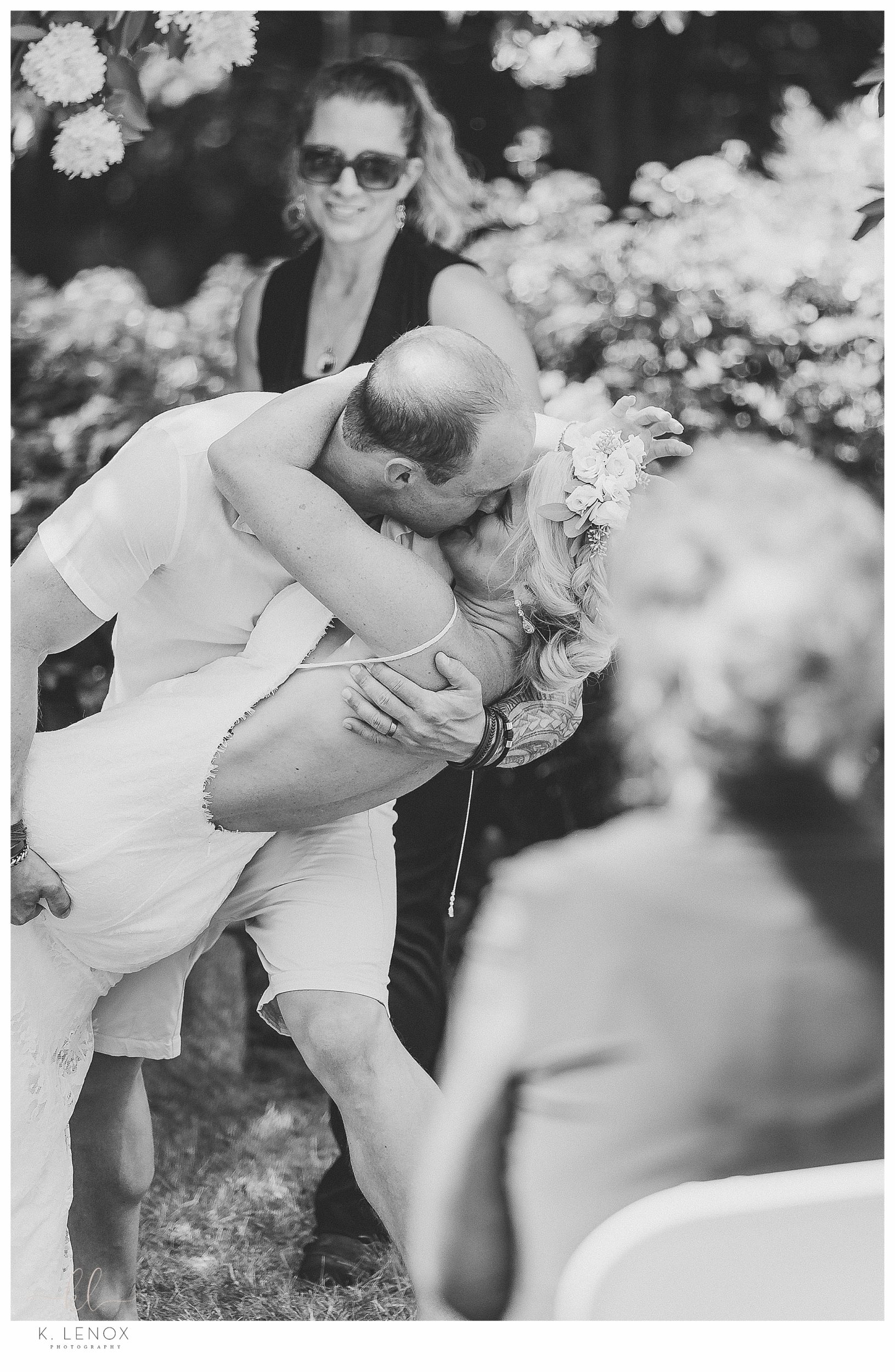 Light and Airy Micro Wedding at Moran Estates- Black and white photo of the first kiss. 