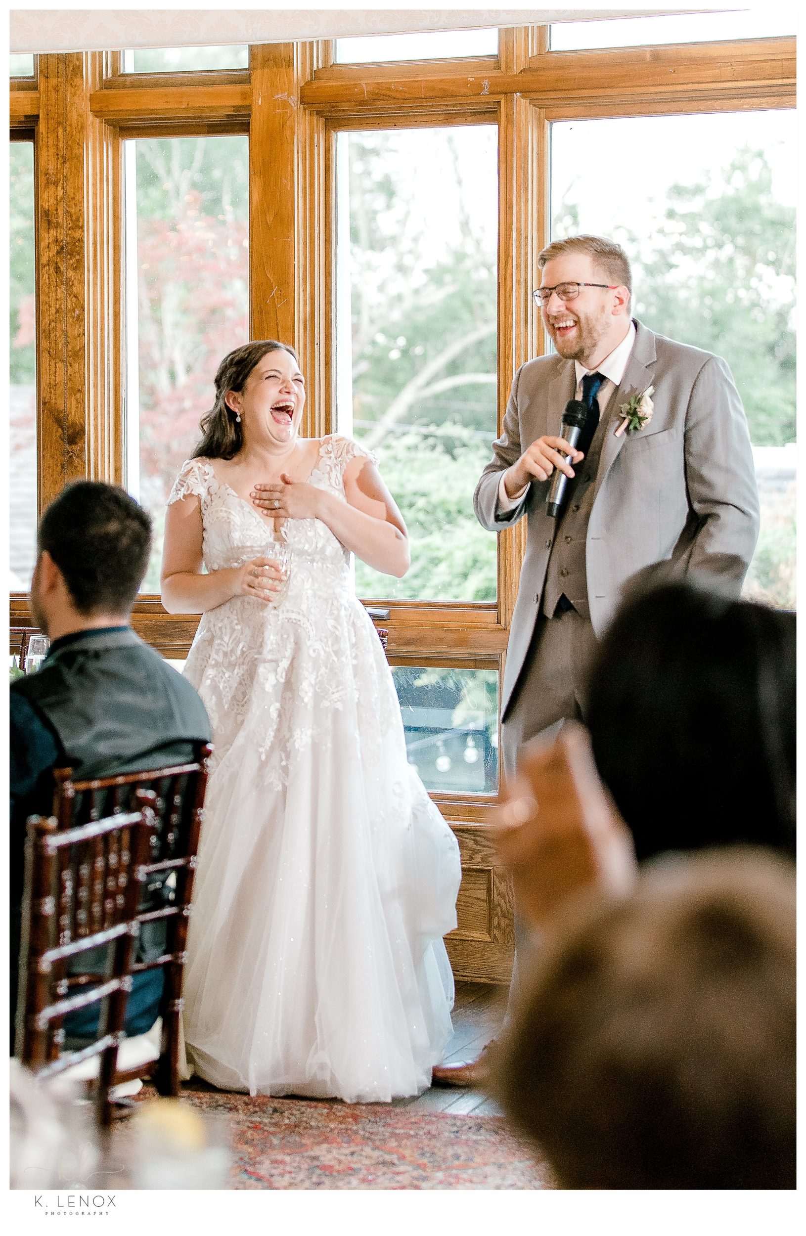 Summer Wedding at the Bedford Village Inn= Bride and groom give a toast. 