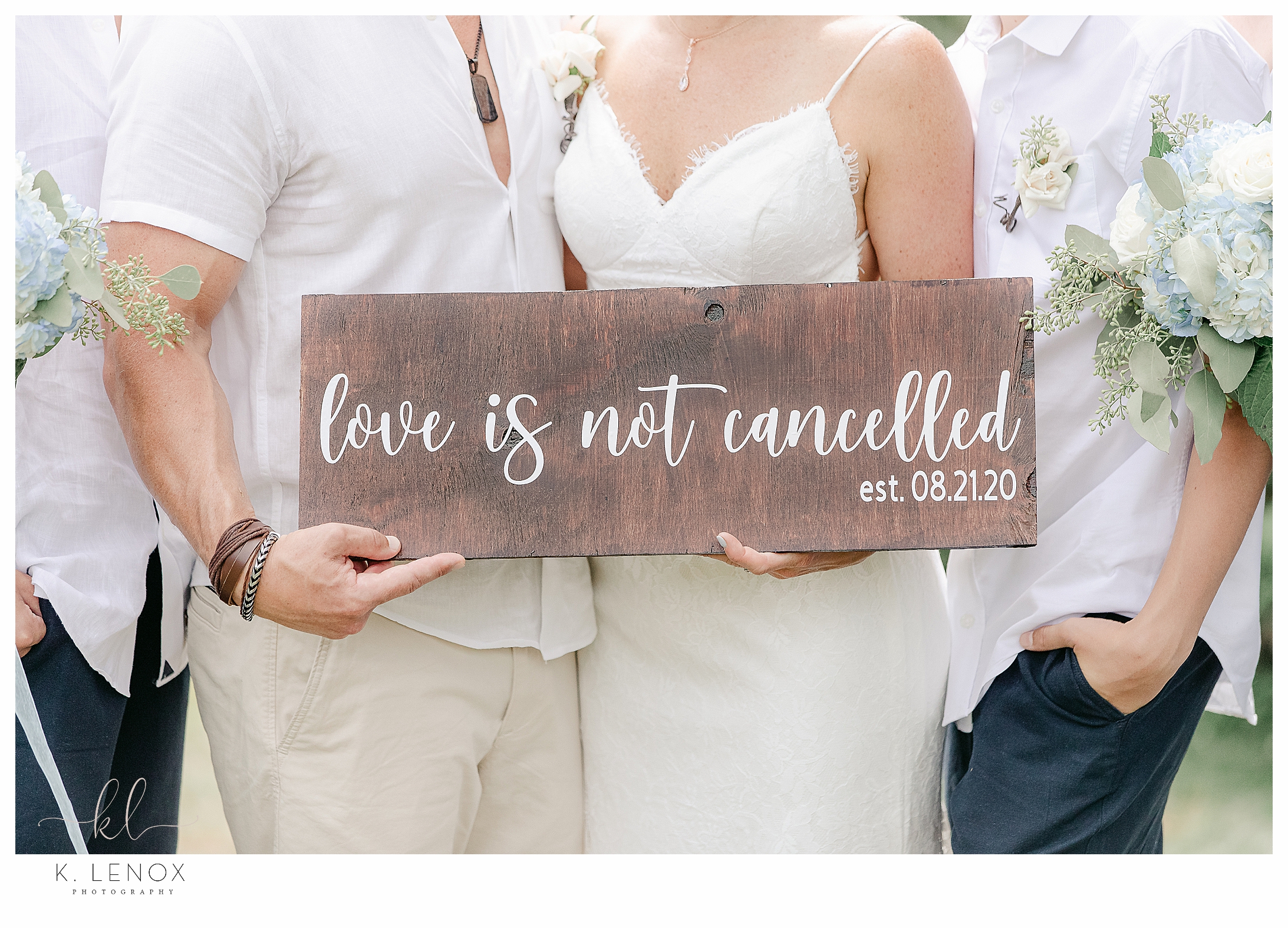 Wooden Sign saying 'Love is not cancelled"