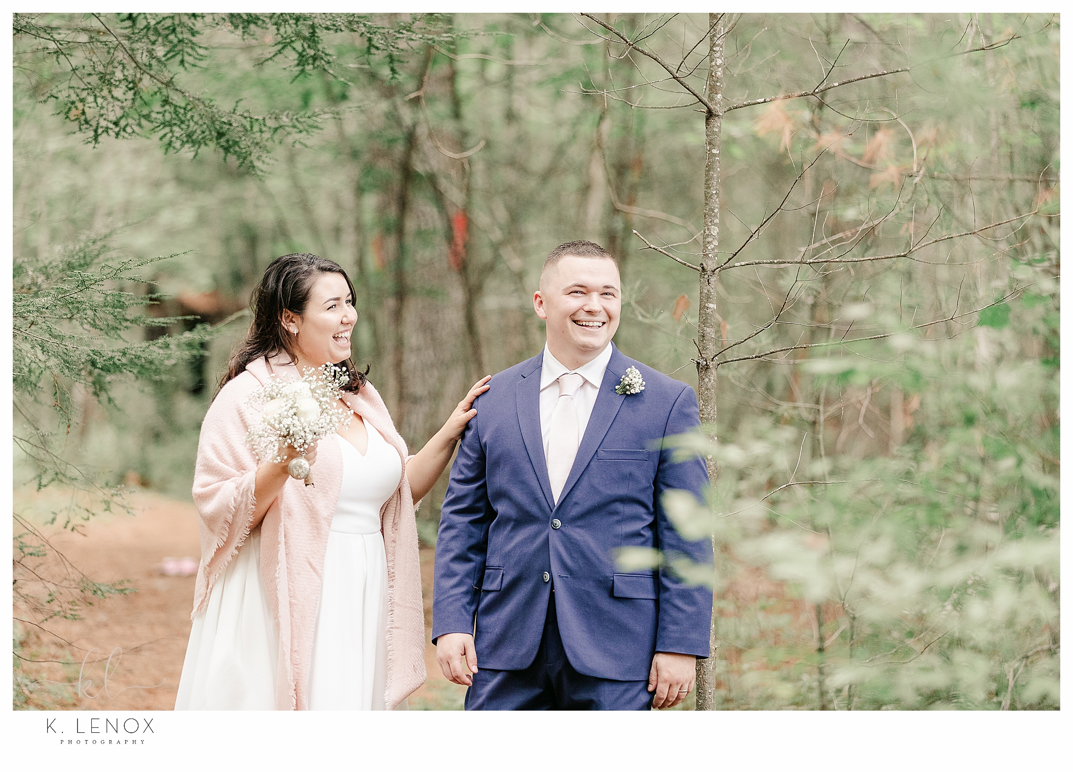 Candid photo of a bride and groom laughing after their backyard elopement. 