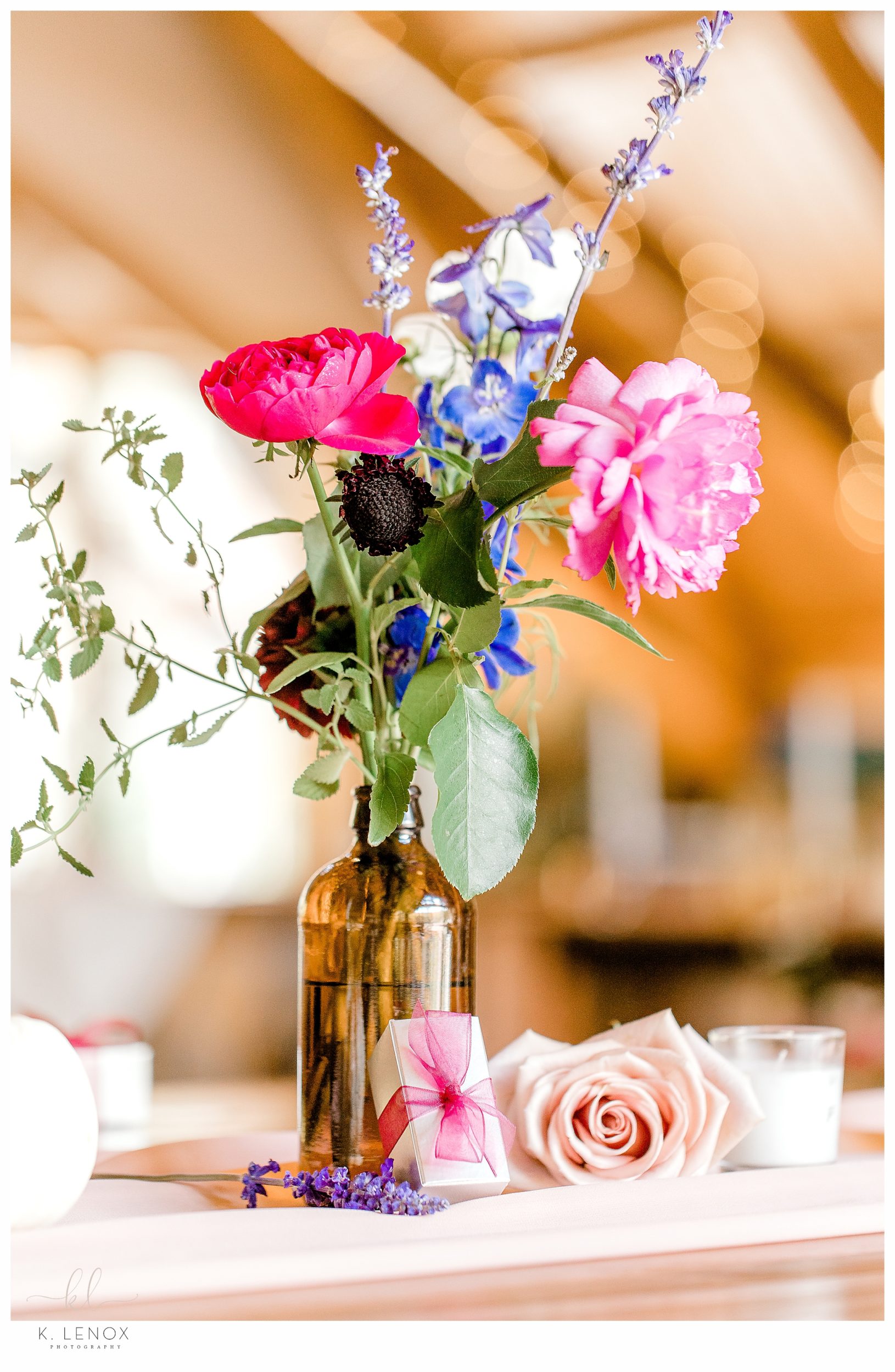  Table Scape showing vase and flowers. 