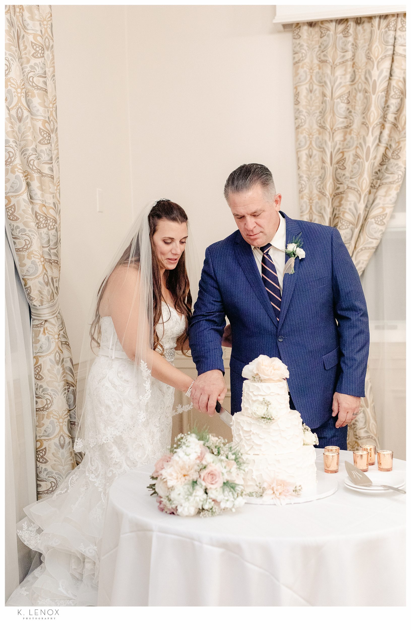 Wedding at the Keene Country Club- Couple Cutting the cake
