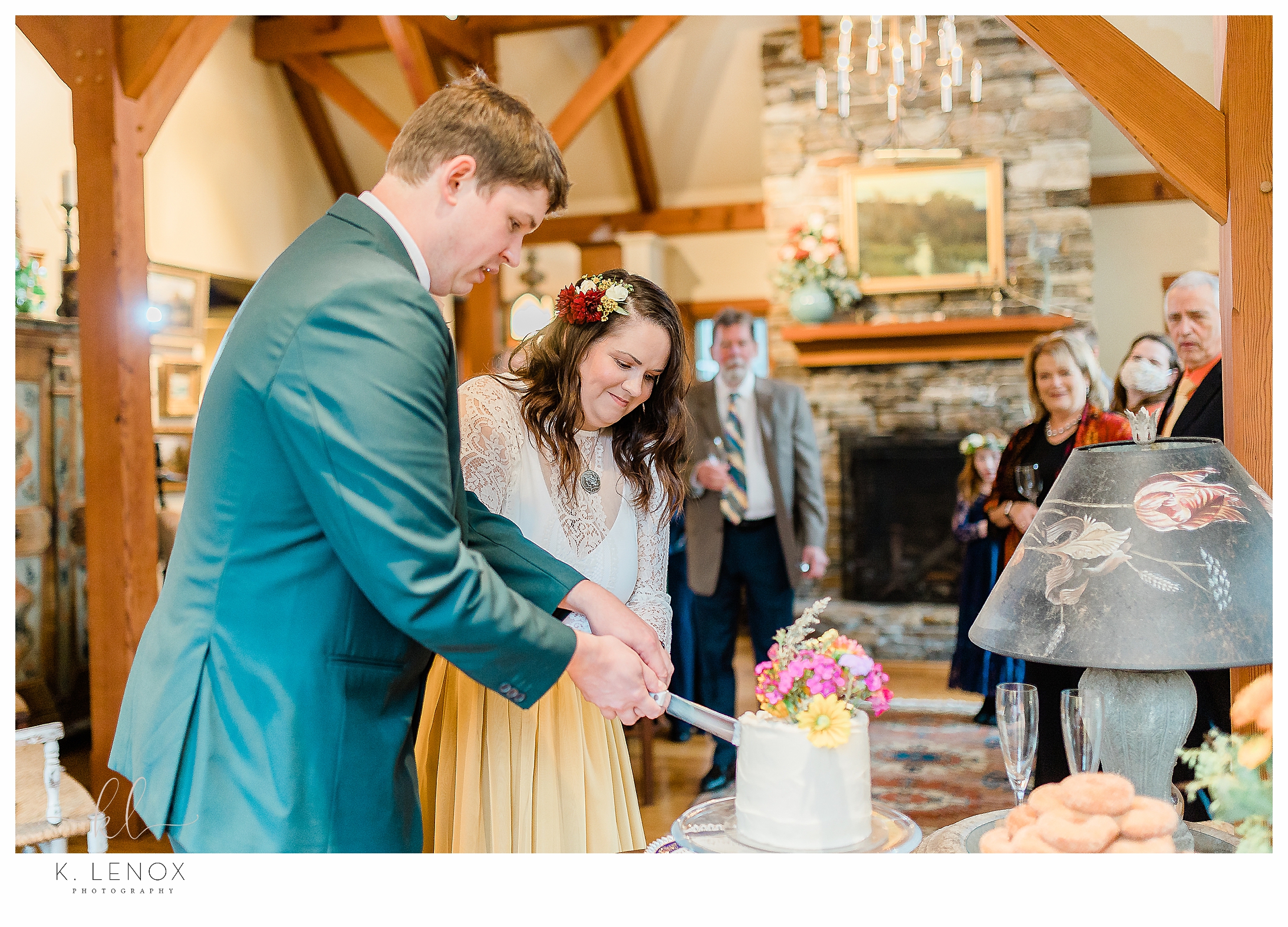 Fall MicroWedding at Moran Estates,  Bride and Groom cut the cake