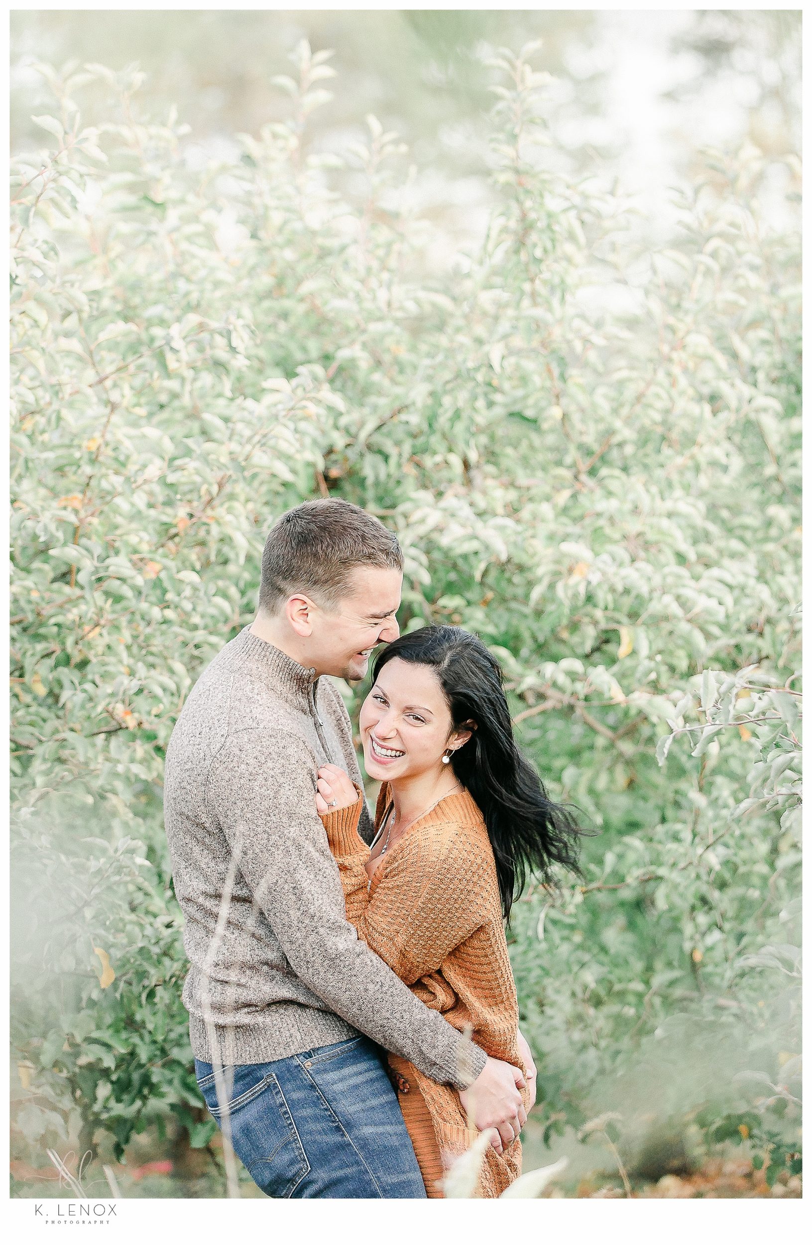 Fun and Carefree Engagement Session in NH- Man and woman hugging. 