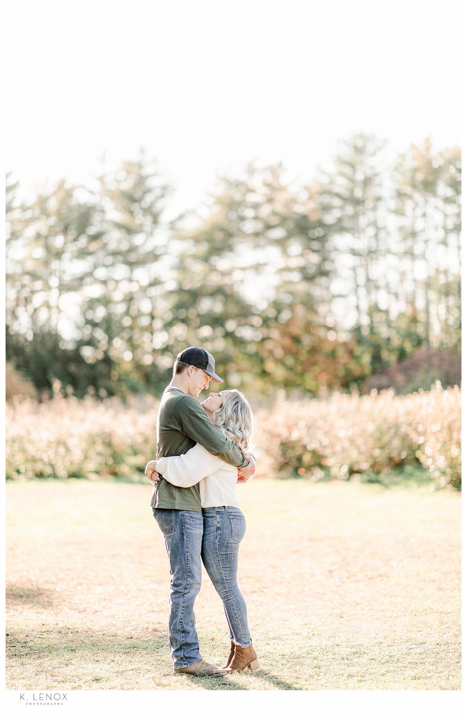 Light and Airy Engagement Session at Riverview Farm- Man and Woman hug