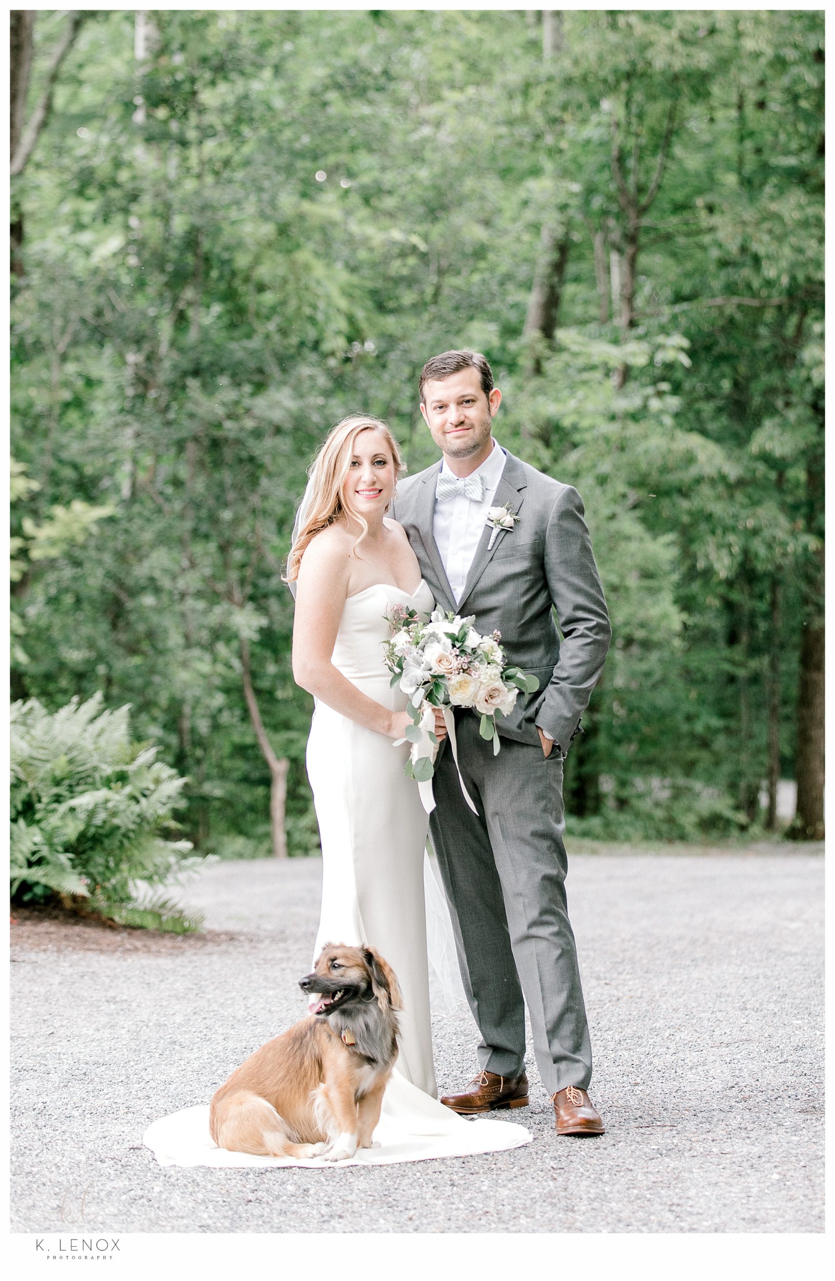 Formal Wedding day photo of a bride and groom and their dog. Taken by K. Lenox Photography
