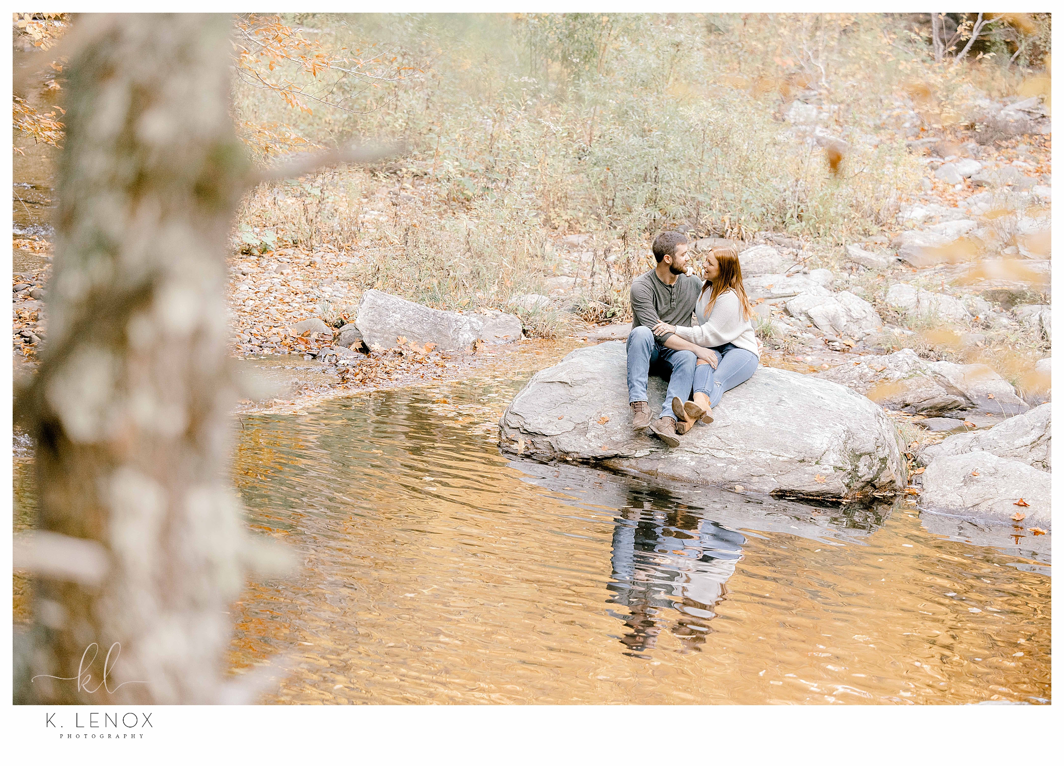 A couple gets their engagement photos taken during the Fall in Vermont. 